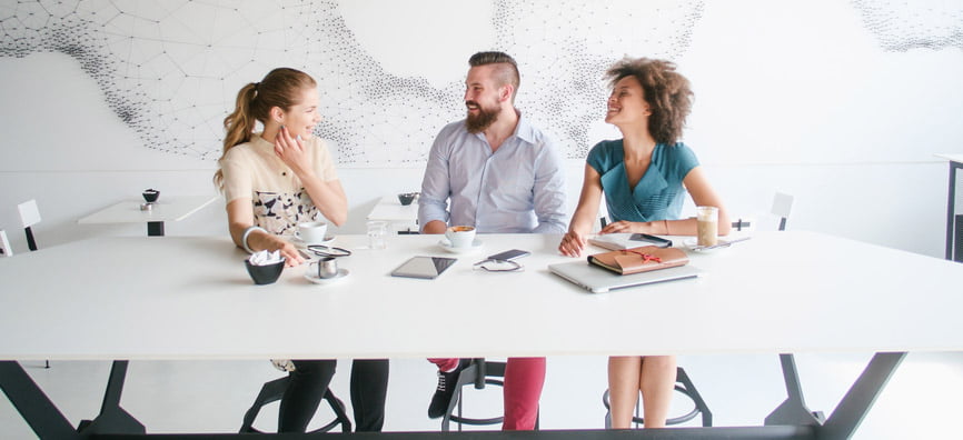 Group of three people at a table